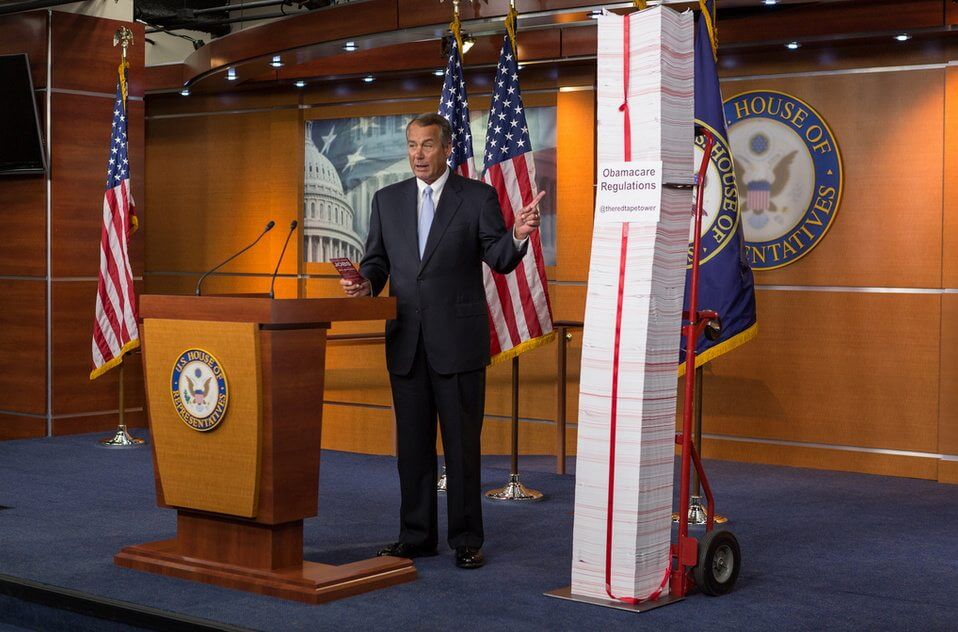 Speaker Boehner with the "Red Tape Tower" of ObamaCare regulations