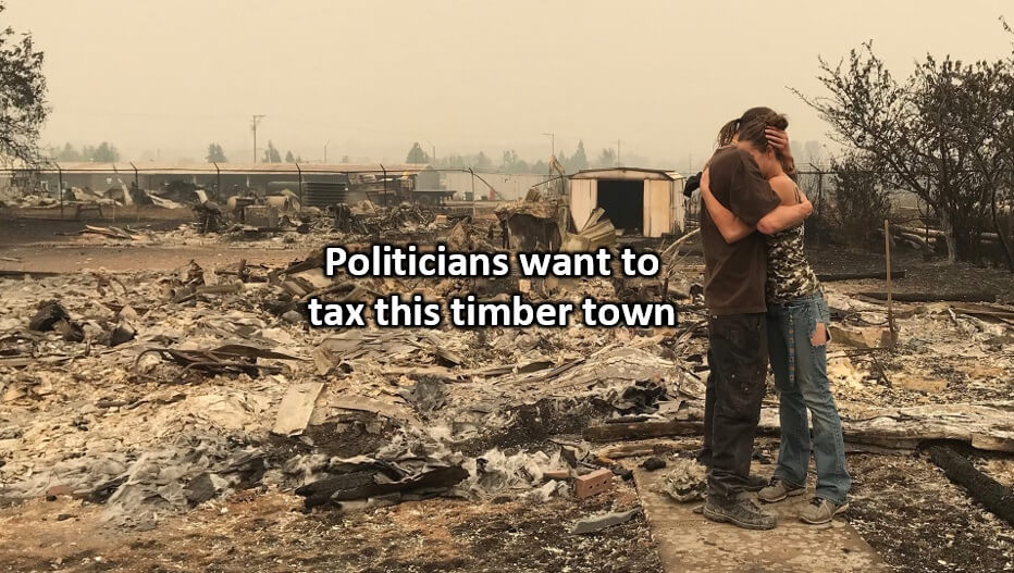 Image: Distraught couple outside their burnt-to-the-ground home