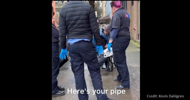(video) Medic hands meth pipe back to injured addict